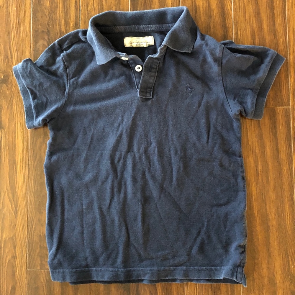 Label of graded goods boys polo shirt.  Blue. Size 6-8